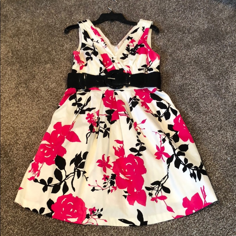 Pink, black and white dress with black belt